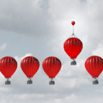 Picture of hot air balloon that look the same even though one is better, a metaphor for the different versions of QuickBooks