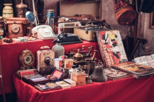 A picture of Antique watches, magazines, phones, suitcases and other retro products for a blog post about Section 199A trade or business