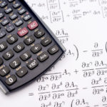 A picture of a Scientific calculator and mathematical equations for the calculus of growth